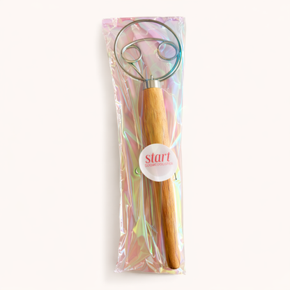 Sourdough whisk with wooden handle, packaged by Start for bread dough mixing